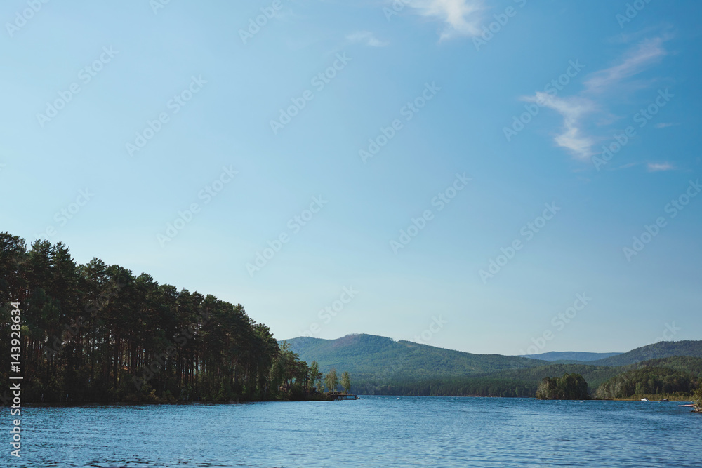 Scenery of nature with lake, mountains and forest