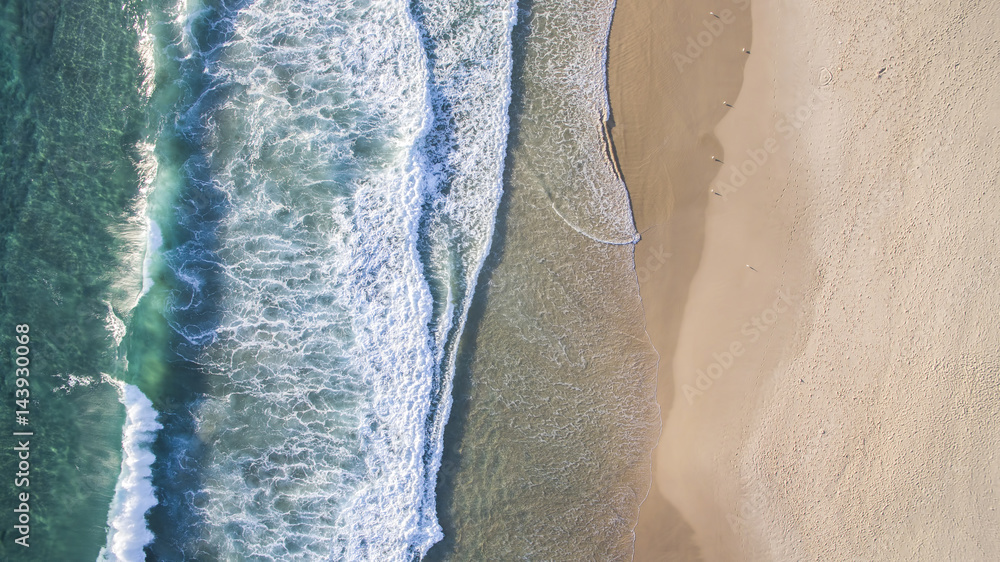 Aerial view of beach ocean waves and sand on Gold Coast beach Aerial view of beach ocean waves and sand on Gold Coast beach