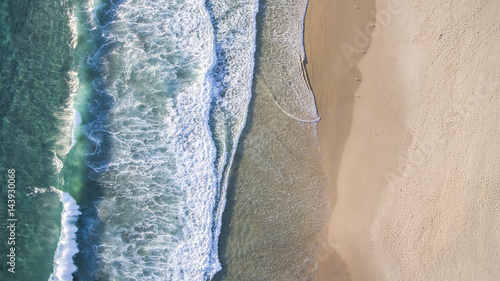 Aerial view of beach ocean waves and sand on Gold Coast beach