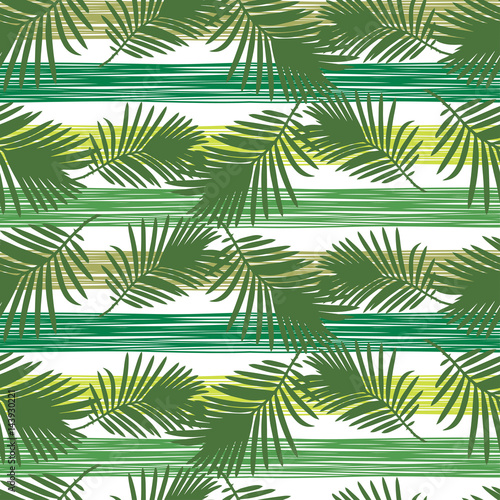 Seamless vector background with decorative leaves. Palm leaves.