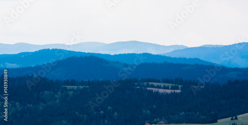Panorama of the blue mountains rising in the distance © seakitten