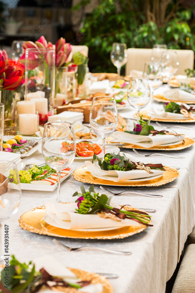 Served table with plates and snacks