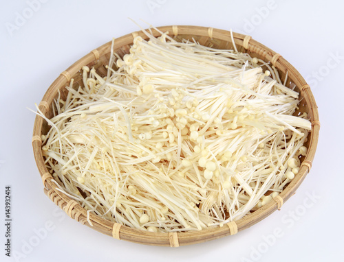 golden mushroom in a bamboo basket 