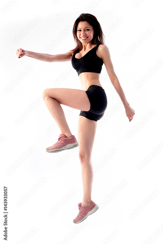 Athlete girl in sportweear running on white background Athlete girl in sportweear running on white background