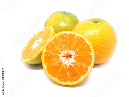 Orange citrus fruit with slice on white background.