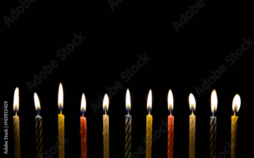 Lighting of birthday candle in the darkness