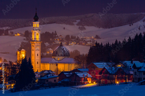 Town, Altopiano of Asiago, Province of Vicenza, Veneto, Italy. Cathedral of Saint Matteo at night. photo