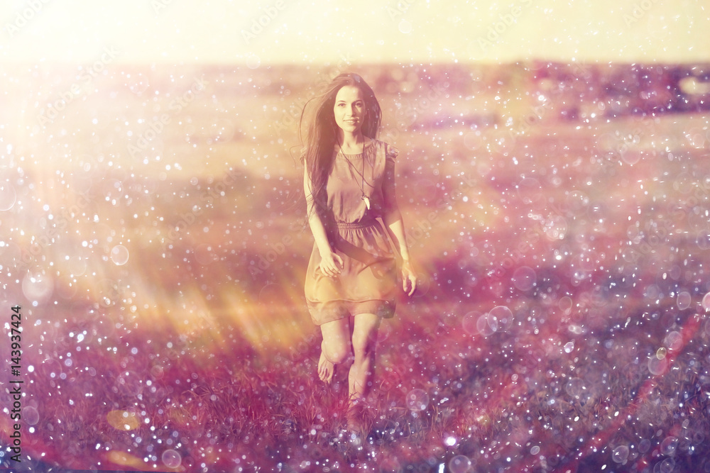 Happy girl running in the summer field Happy girl running in the summer field