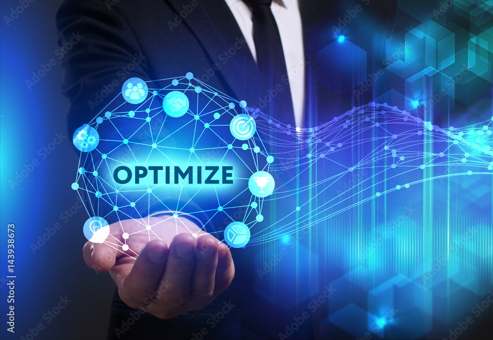 Fototapeta premium Business, Technology, Internet and network concept. Young businessman working on a virtual screen of the future and sees the inscription: Optimize