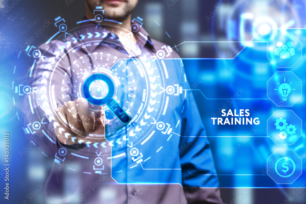 Business, Technology, Internet and network concept. Young businessman working on a virtual screen of the future and sees the inscription: Sales training Business, Technology, Internet and network concept. Young businessman working on a virtual screen of the future and sees the inscription: Sales training