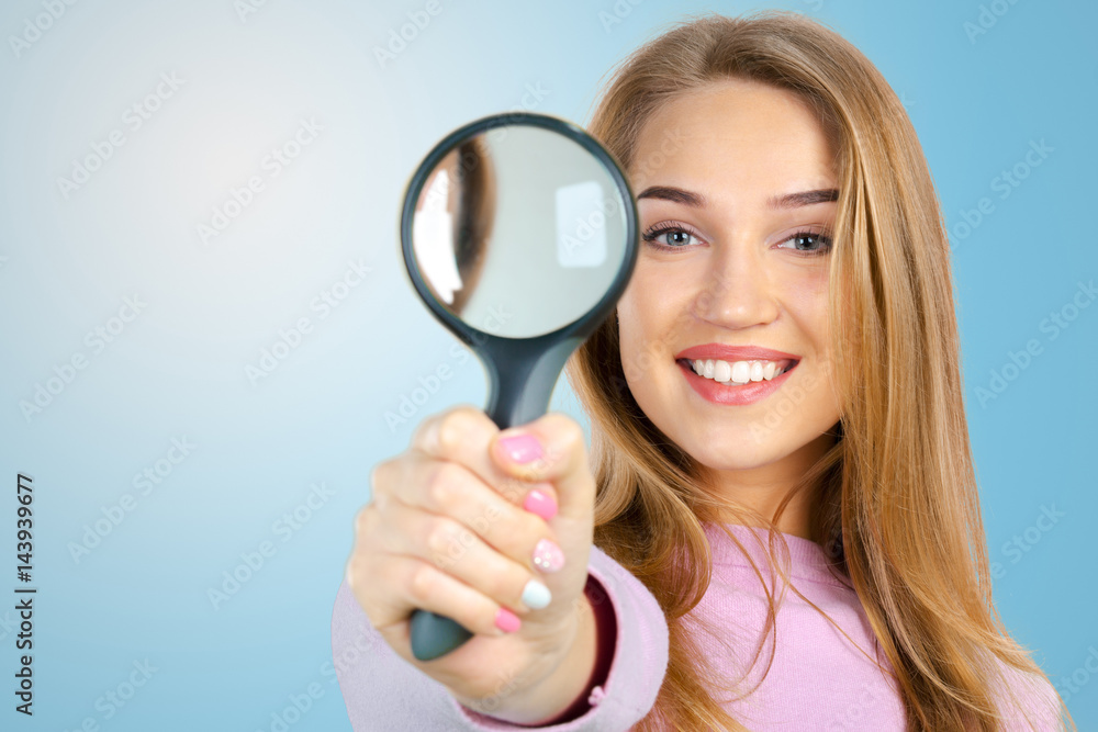 Woman with magnifying glass Woman with magnifying glass