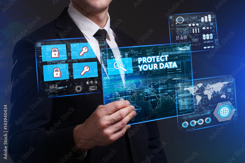 Business, Technology, Internet and network concept. Young businessman working on a virtual screen of the future and sees the inscription: Protect your data Business, Technology, Internet and network concept. Young businessman working on a virtual screen of the future and sees the inscription: Protect your data
