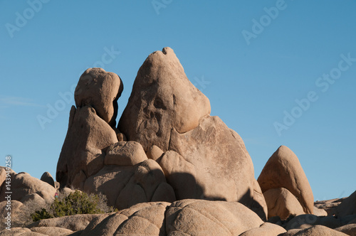 Closeup of rocks that look like a wolf howling at the moon