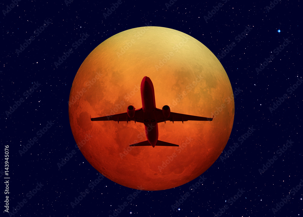 Naklejka premium Passenger airplane with lunar eclipse