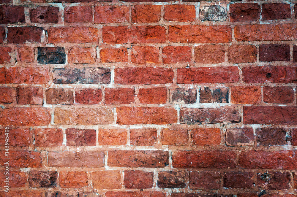 Naklejka premium Old wall of red bricks, vintage texture