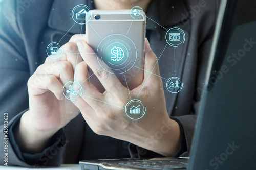 Wallpaper Mural Online banking payment communication network digital technology application development mobile smartphone sync app: Close up hand business woman/ man holding mobile phone with Mobile banking icon flow Torontodigital.ca