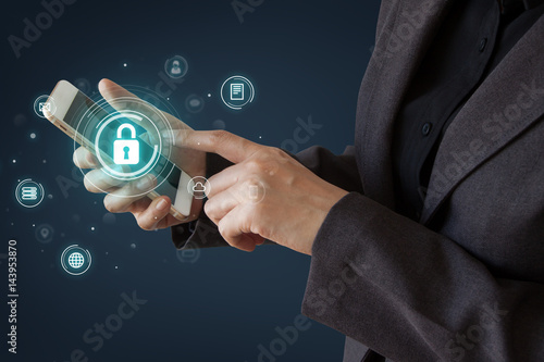 Wallpaper Mural Business, technology, internet and networking concept. businessman working on his laptop and mobile in the office select the icon security on the virtual display. Cyber security Torontodigital.ca