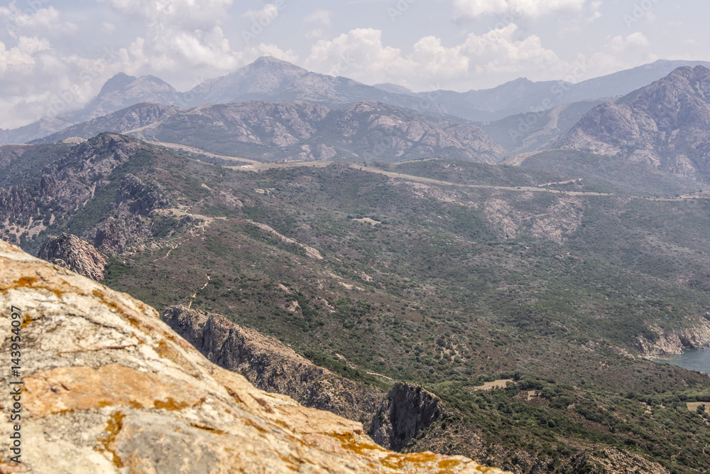 Fototapeta premium Panorama of a sunny mountainscape
