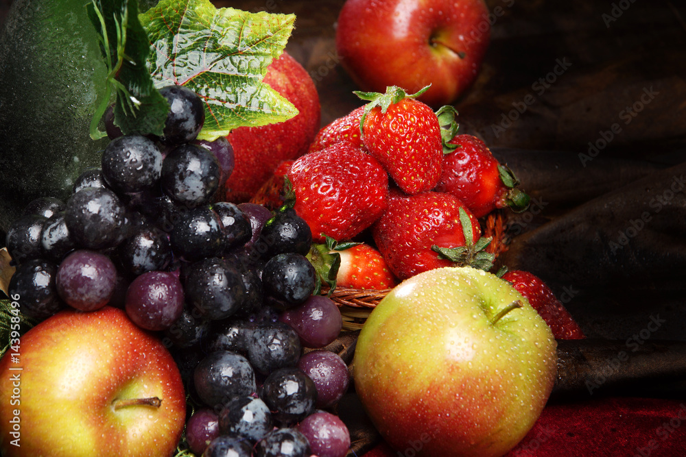 Juicy bright fruit, sprinkled with water, still life of seasonal fruits and berries Juicy bright fruit, sprinkled with water, still life of seasonal fruits and berries