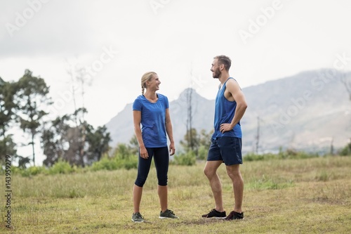 Fit people having a conversation
