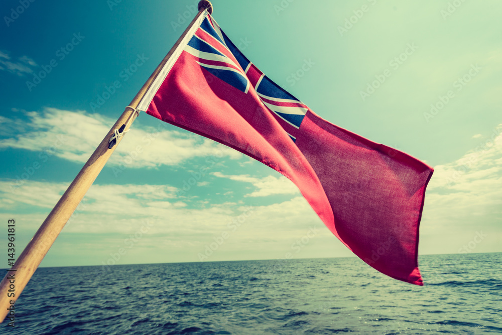 uk red ensign the british maritime flag flown from yacht Stock Photo Adobe Stock