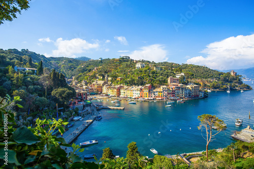 PORTOFINO, ITALY, APRIL 8, 2017 - Panoramic view of Portofino, an Italian fishing village, Genoa province, Italy. A tourist place with a picturesque harbour and colorful houses
