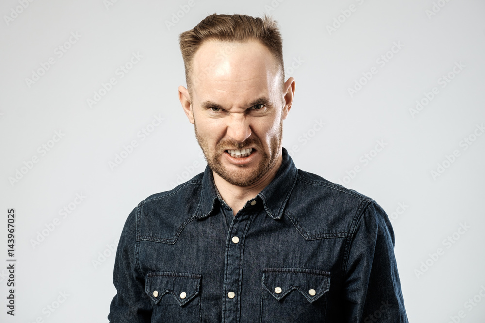 Portrait of angry young man isolated Portrait of angry young man isolated