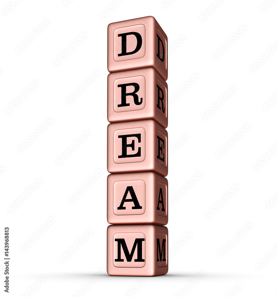 Dream Word Sign. Vertical Stack of Rose Gold Metallic Toy Blocks. Dream Word Sign. Vertical Stack of Rose Gold Metallic Toy Blocks.