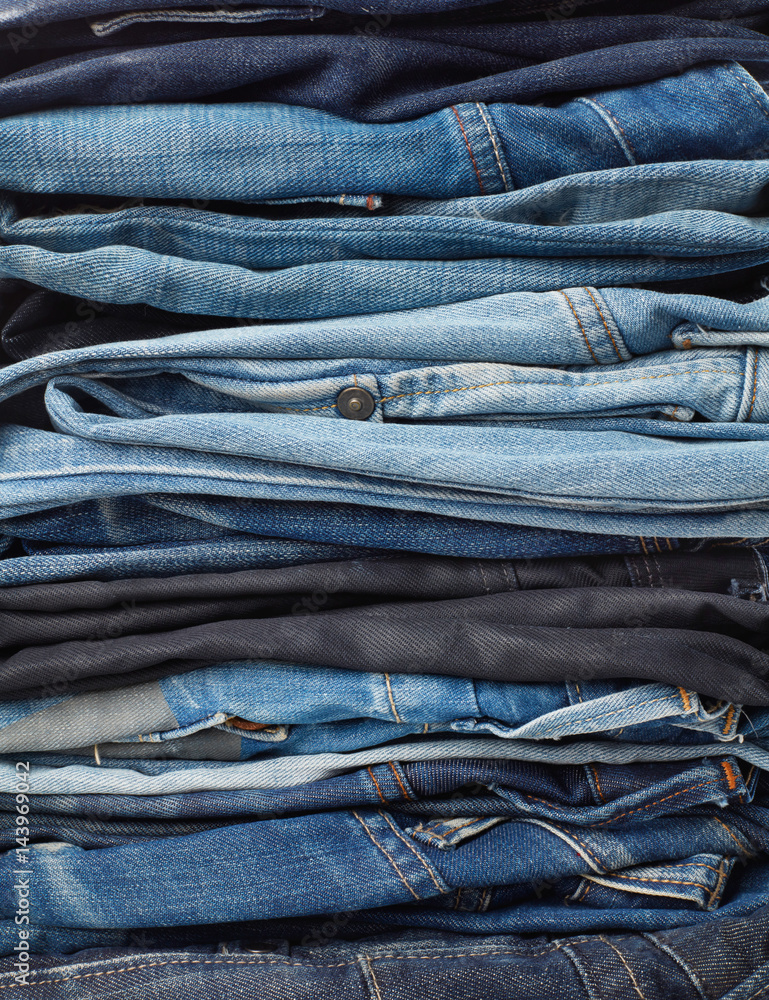 Stack of jeans background