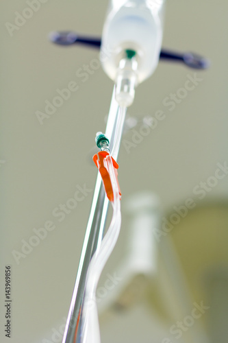 an infusion hangs in a medical room © Katja