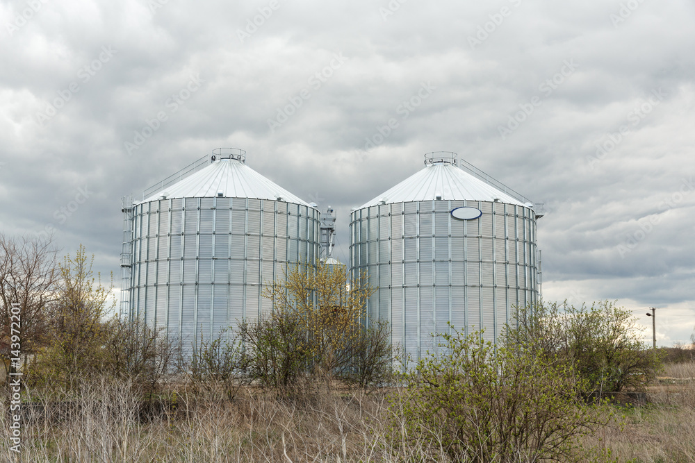 Big grain elevator in а rural zone Big grain elevator in а rural zone
