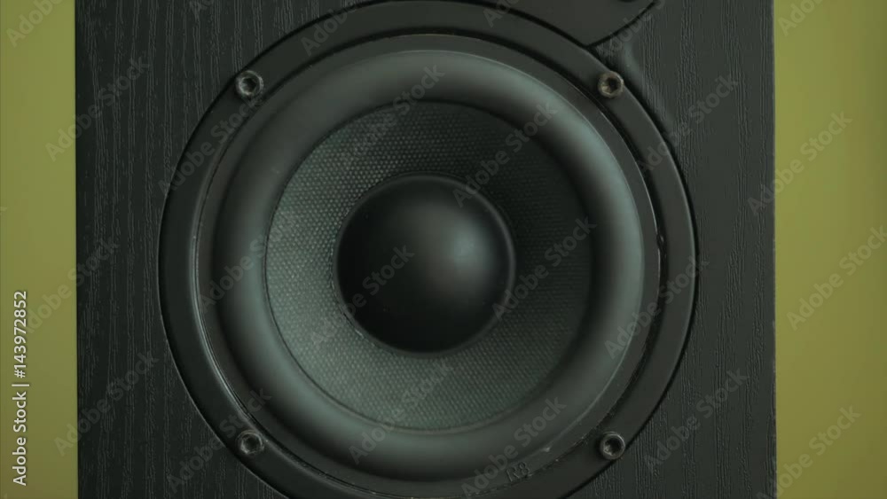 close up of speaker vibrating while playing music close up of speaker vibrating while playing music