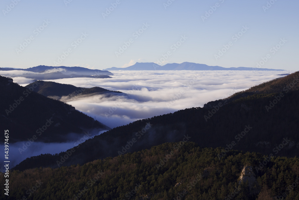 Mountains and foggy valley