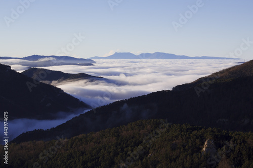 Mountains and foggy valley