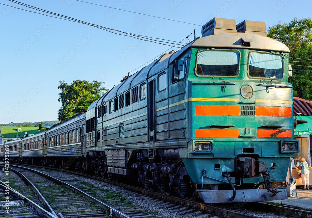 Naklejka premium Train on railroad station