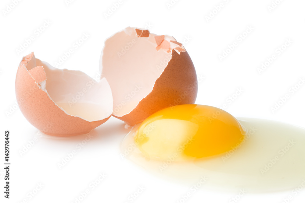 A broken chicken egg lies on a white background with a shell, yolk and spilled protein, isolated
A broken chicken egg lies on a white background with a shell, yolk and spilled protein, isolated