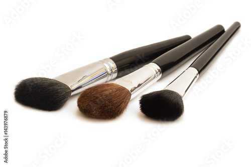 Makeup brush set. Isolated. White background. Three subjects.