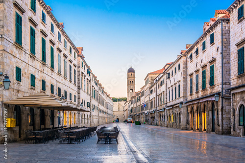 Stradun Dubrovnik Croatia. / Scenic morning view at marble old historic street Stradun (Placa) in famous touristic resort in Europe, Dubrovnik town, Croatia. photo