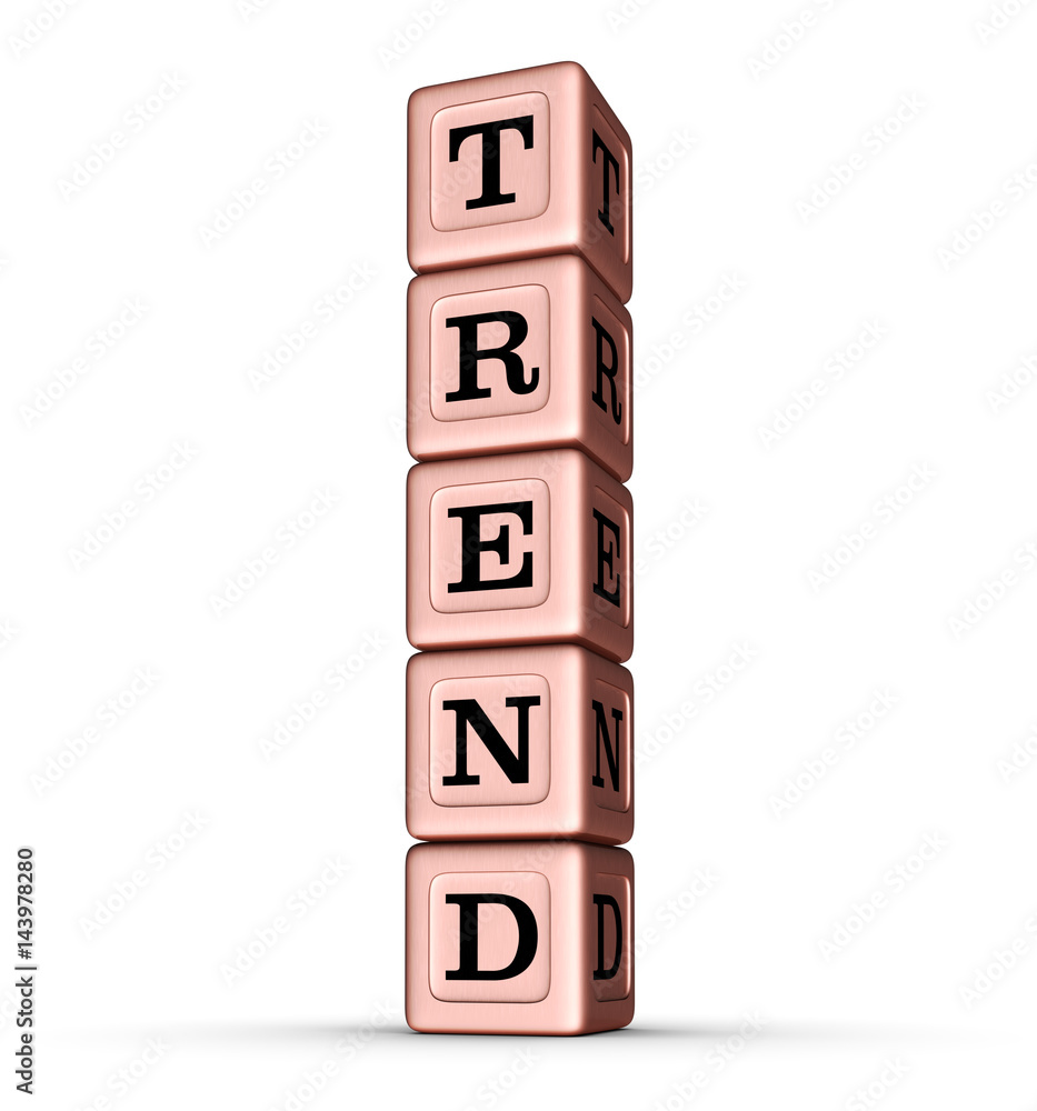 Trend Word Sign. Vertical Stack of Rose Gold Metallic Toy Blocks. Trend Word Sign. Vertical Stack of Rose Gold Metallic Toy Blocks.