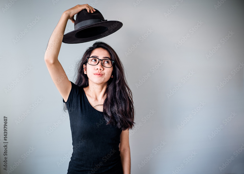 portrait of a beautiful young tender teenage girl and hipster asian woman model with Black hair posing in studio and showing different emotions . Laughing, smiling, anger, suspicion, fear, surprise. portrait of a beautiful young tender teenage girl and hipster asian woman model with Black hair posing in studio and showing different emotions . Laughing, smiling, anger, suspicion, fear, surprise.
