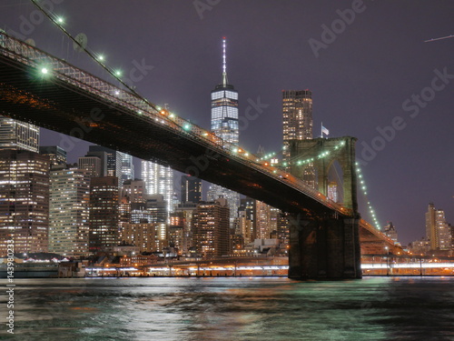 Brooklyn bridge and lower Manhattan skyline at night view from DUMBO