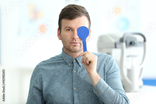 Young man visiting an ophth...