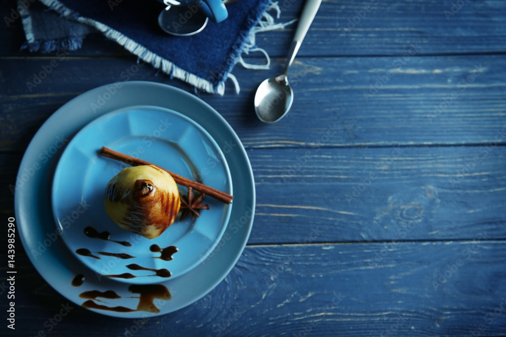 Fototapeta premium Tasty pears with sweet sauce on wooden table