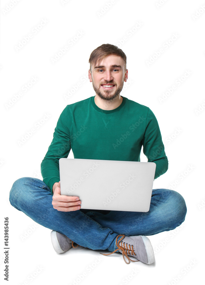 Young programmer using laptop on white background Young programmer using laptop on white background