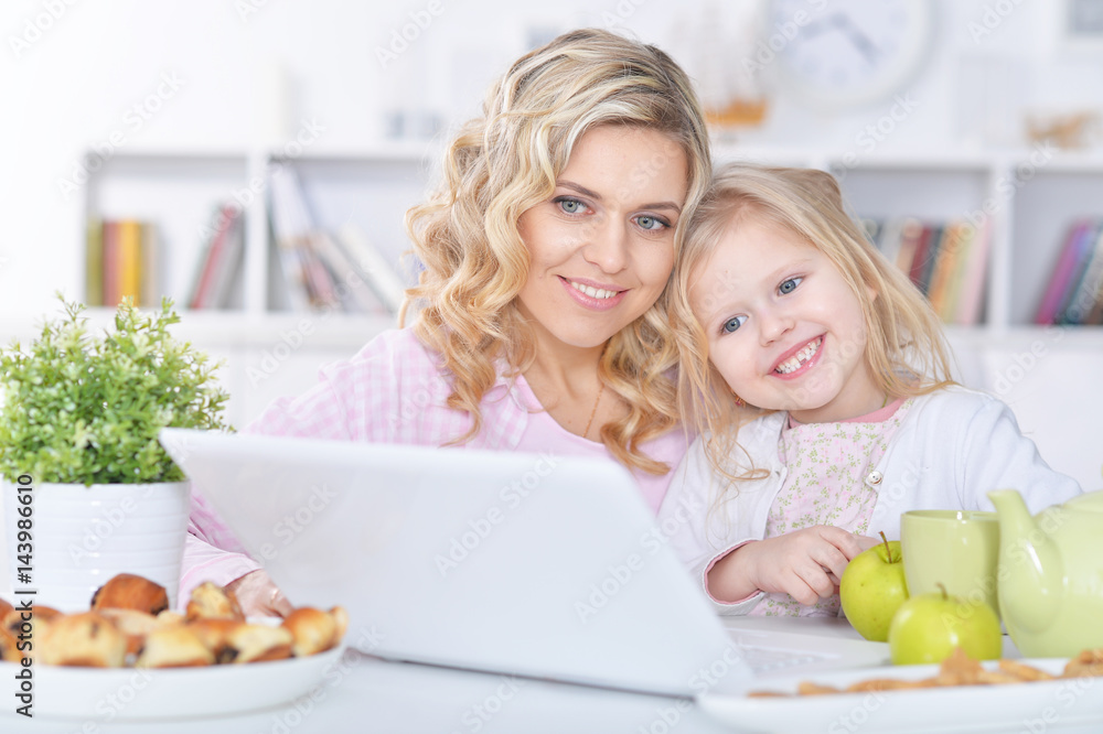 Mom and daughter at the table Mom and daughter at the table