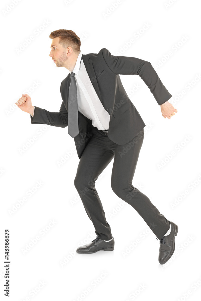 Handsome running businessman on white background Handsome running businessman on white background