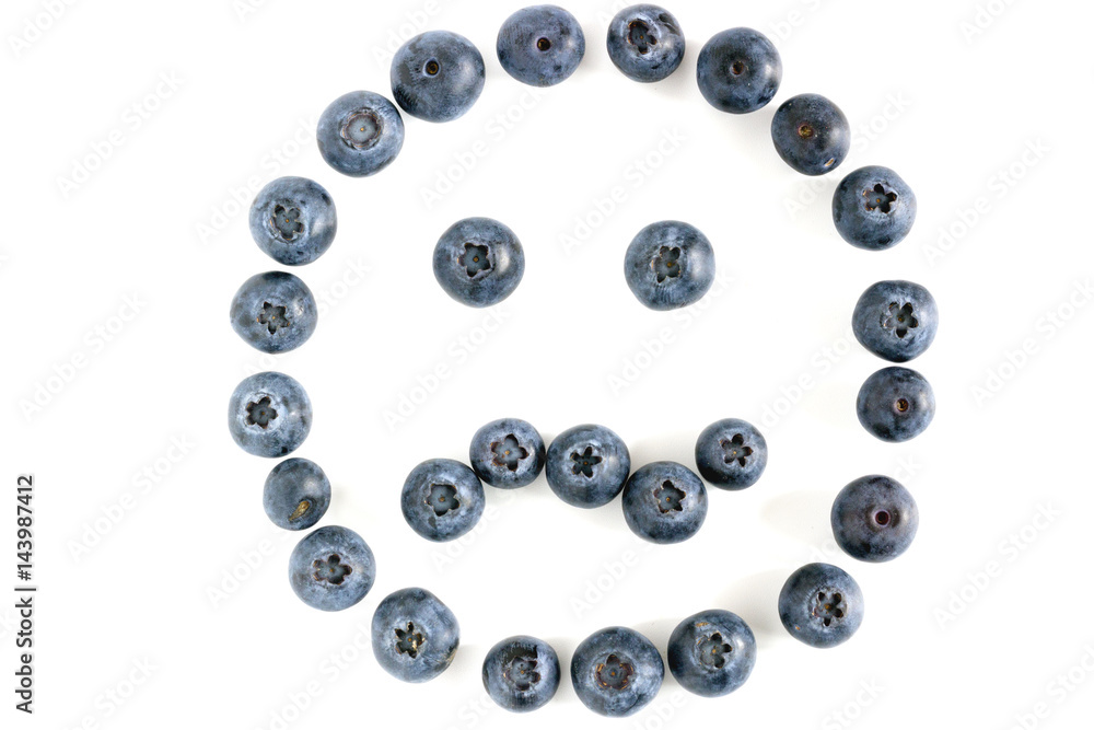 closeup of isolated blueberry angry face on white background closeup of isolated blueberry angry face on white background