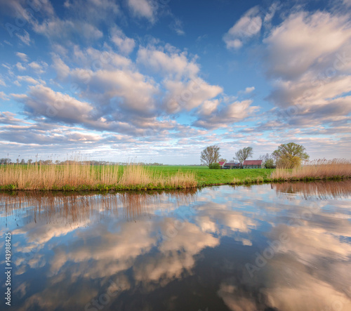 Colorful blue sky with clou...