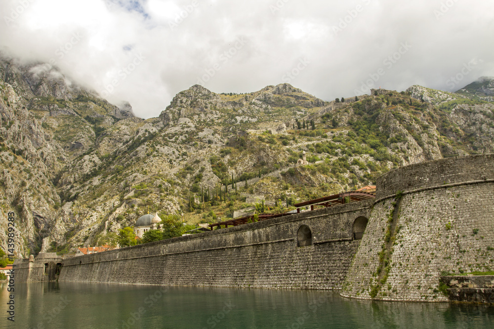 Kotor is a town in Montenegro. It Located in Boka Kotorska Bay of the Adriatic Sea. The old part of the city is under UNESCO protection. Kotor is a town in Montenegro. It Located in Boka Kotorska Bay of the Adriatic Sea. The old part of the city is under UNESCO protection.
