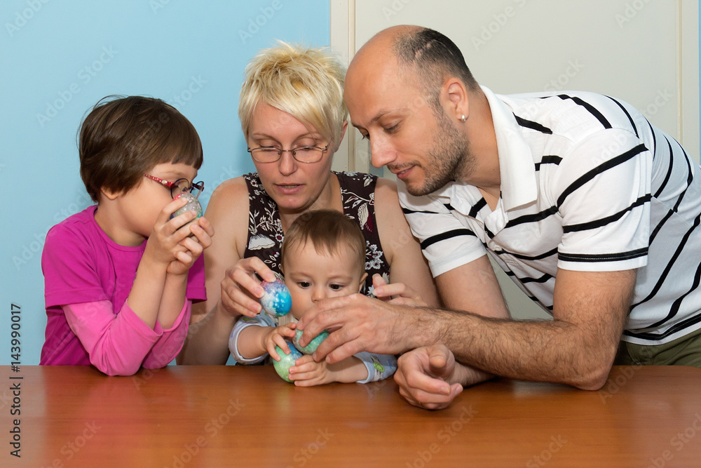 Naklejka premium Family having breakfast on Easter day